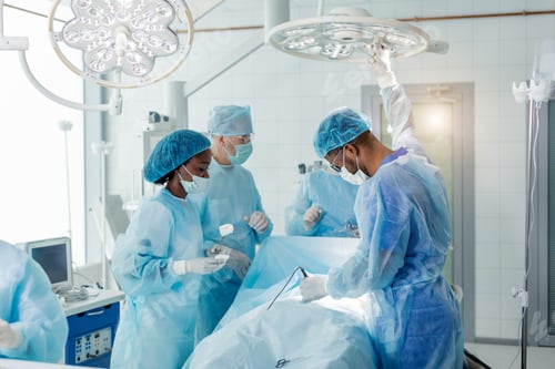 Preview: dmotivated skilled multiracial doctors working with donor