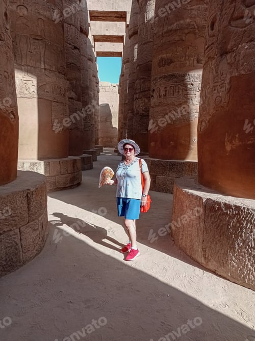 Preview: Caucasian tourist inside of an ancient egyptian temple