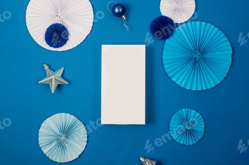 Preview: Holiday Ornaments and White Box on Blue Backdrop