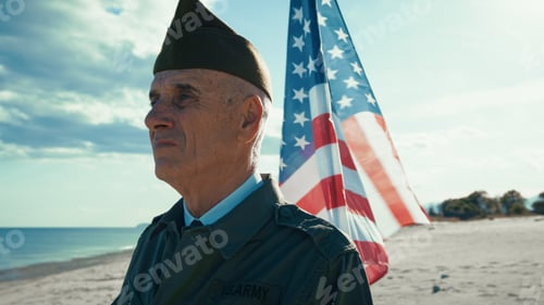 Preview: United States Veteran Looks At The Ocean From The Beach