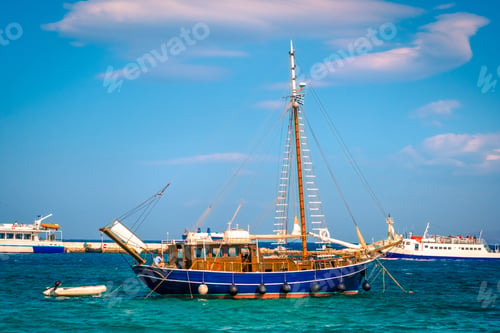 Preview: Beautiful wooden boat on water i