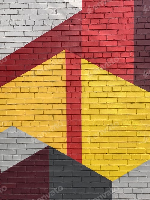 Preview: Bright colorful wall geometric forms painted made of brick concrete