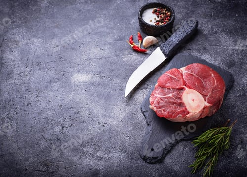 Preview: Raw meat osso buco on slate cutting board