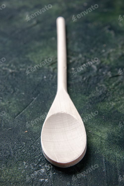 Preview: front close view white plastic spoon on dark background plastic fork cutlery wood color food