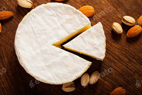 Preview: Camembert cheese or brie on wooden background
