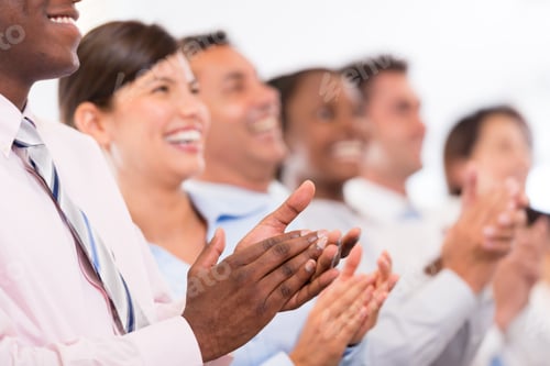 Preview: Happy Business Group Applauding At The Office