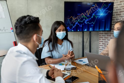 Preview: Multiethnic Coworkers Wearing Protective Face Having Meeting In Conference Room In Office