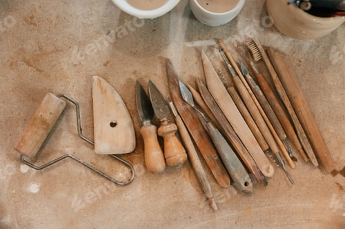 Preview: Pottery tools. Close up view of the table with instruments