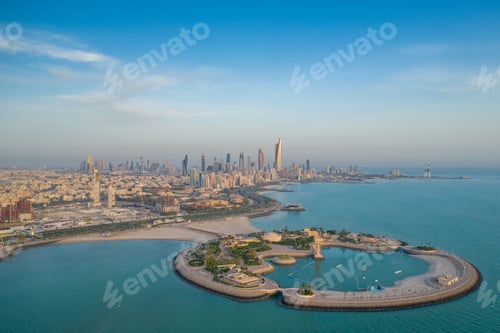 Preview: High-angle shot of The Green Island with a skyline of the city of Kuwait in the background