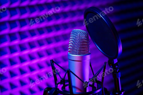 Preview: Professional studio microphone against acoustic foam panel background in neon light