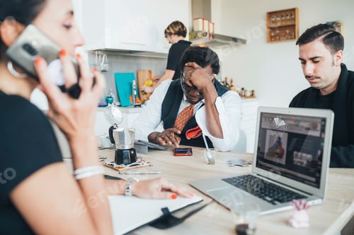 Preview: Businessmen and businesswoman using smartphone in loft office