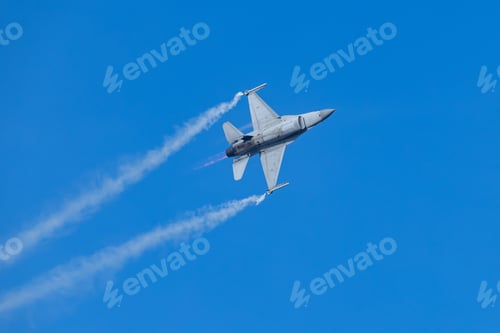 Preview: Military Fighter Jet Performing Aerobatic Flight Maneuver