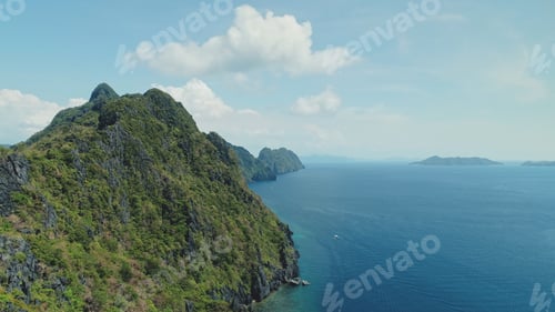 Preview: Mountainous island landscape with green tropic jungle forest. Asia seascape of ocean bay