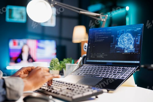 Preview: Black person computing code on laptop