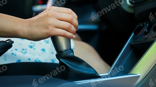 Preview: Close up unrecognizable Caucasian woman girl car buyer automobile driver female hand shifting