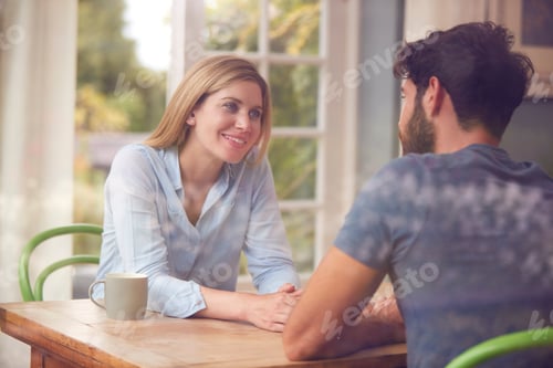 Preview: Couple Meeting For Date In Coffee Shop Viewed Through Window
