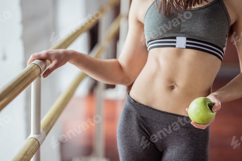 Preview: Young girl with a green apple