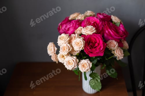 Preview: Elegant Roses in a Vase against Dark Background