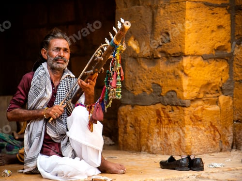 Preview: Street musician playing music instrument