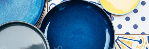 Preview: Plates on tile background