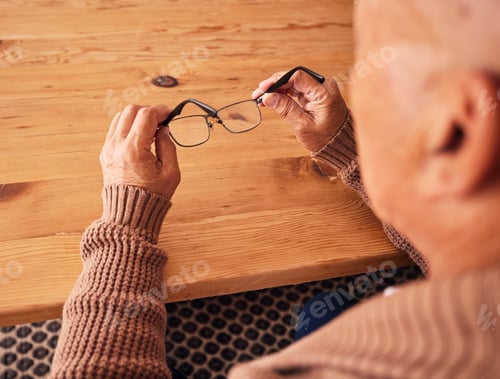 Preview: Senior man, hand holding glasses and eye care with vision, prescription lens and designer frame at