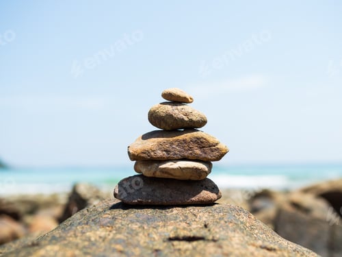 Preview: Stack Stone Pebble Growth on Blur Sea Background