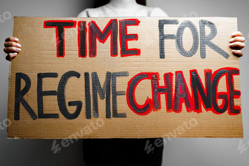 Preview: 'Time for regime change' protest placard close up