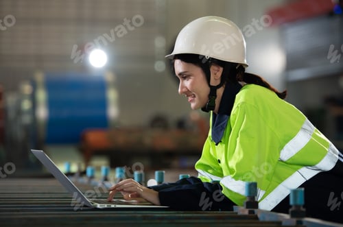 Preview: Portrait of a heavy equipment female engineer from a huge industry