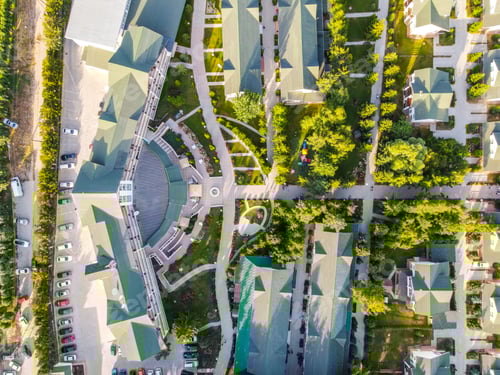 Preview: Top-down view of a resort's buildings and paths