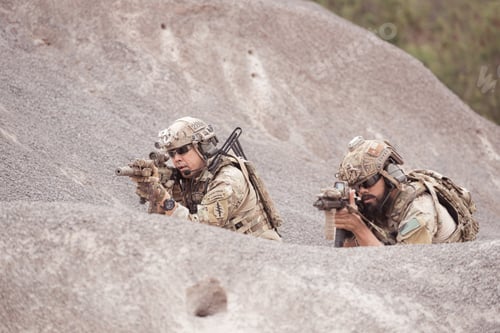 Preview: Soldiers in camouflage military uniforms carrying weapons Reconnaissance missions in rugged mountain
