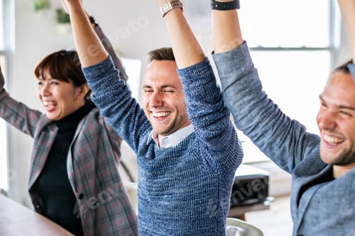 Preview: Team making hands raised in the air