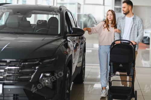 Preview: Young couple buying family suv at car dealership