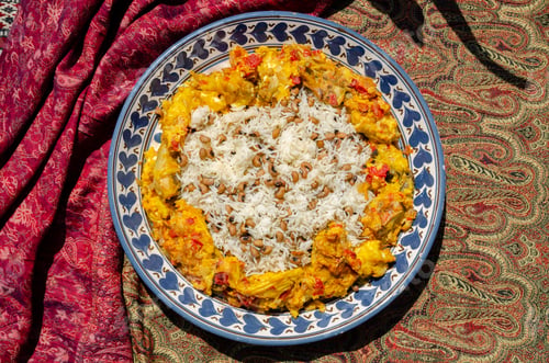 Preview: Traditional caucasian rice dish plov with omlette and lentils