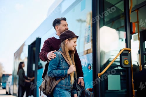 Preview: Happy father and daughter entering a bus at the station.