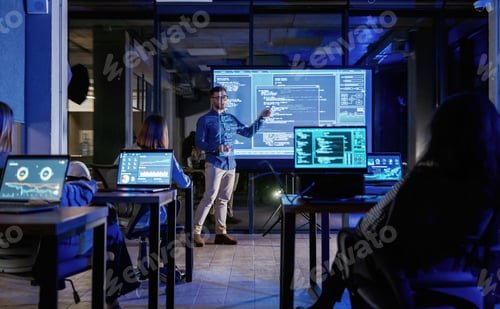 Preview: Talking about project. Male business trainer is against projector with data, teaching people