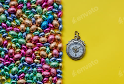 Preview: color Chocolate Easter eggs and alarm clock