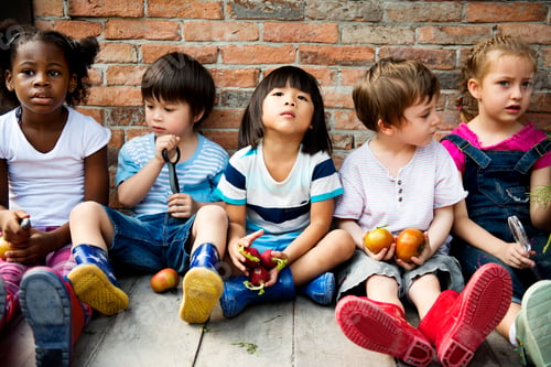 Preview: Group of Diverse Kids Sitting with Fresh Vegetable Together