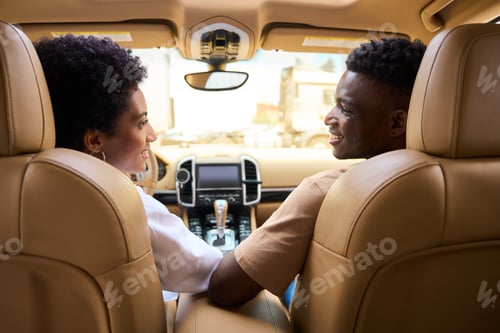Preview: Beautiful African American married couple in a comfortable car