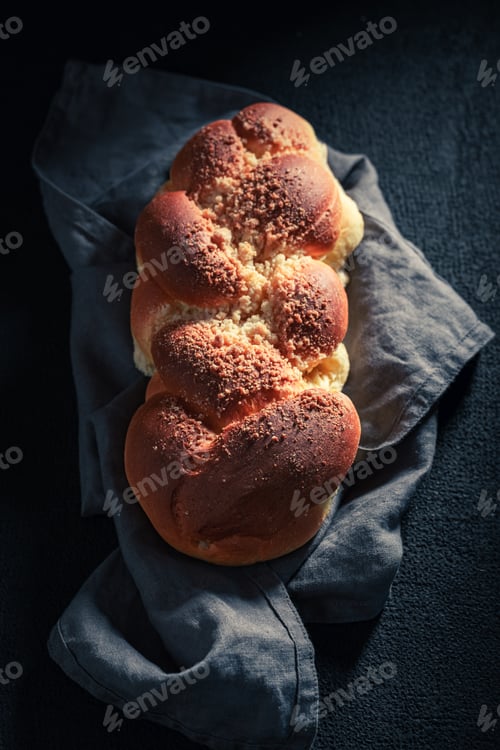 Preview: Sweet challah on dark table for breakfast