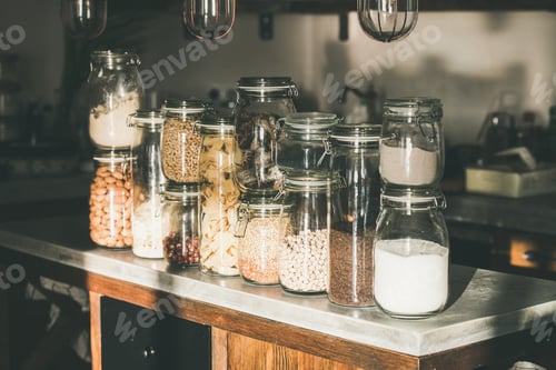 Preview: Grains, cereals, nuts, dry fruit, pasta in jars in kitchen