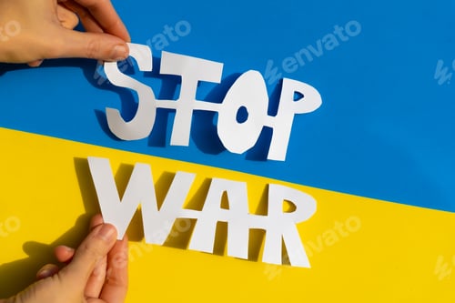 Preview: Stop war, conflict between Ukraine and Russia. Hands of a woman holding a symbol to stop the war