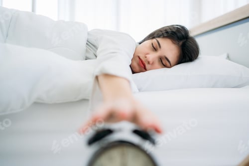 Preview: Young Woman Waking Up with Happiness in Cozy Bedroom at Home.