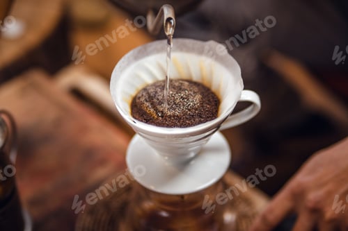 Preview: Closeup of hands barista make coffee