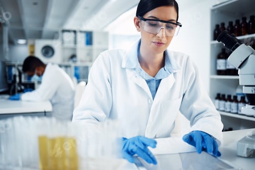 Preview: Shot of a young scientist using a digital tablet while conducting medical research in a laboratory