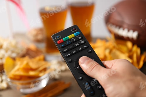Preview: Beer with snacks, a rugby ball and an American flag