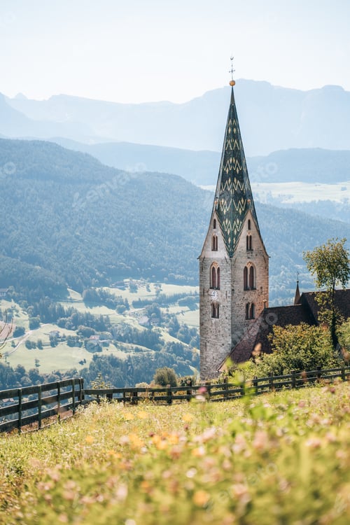 Preview: Church on a mountain overlooking valley in Villandro, Dolomites, Italy
