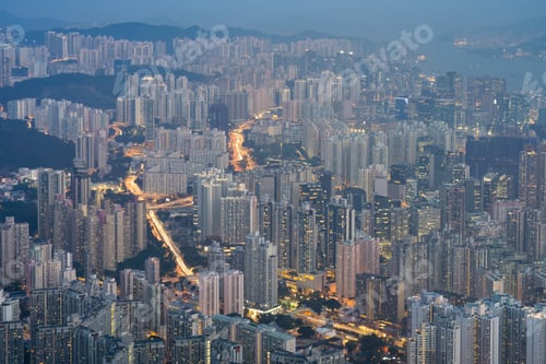 Preview: a very crowded city and large buildings with lights on them