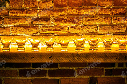 Preview: Array of clear drinking glasses sits atop a table, arranged in an organized manner