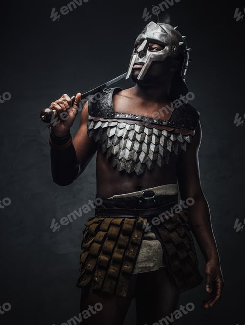 Preview: Studio shot of antique roman gladiator of african ethnic with sword