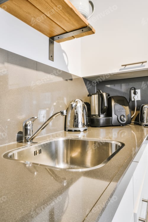 Preview: Interior of modern kitchen with white furniture